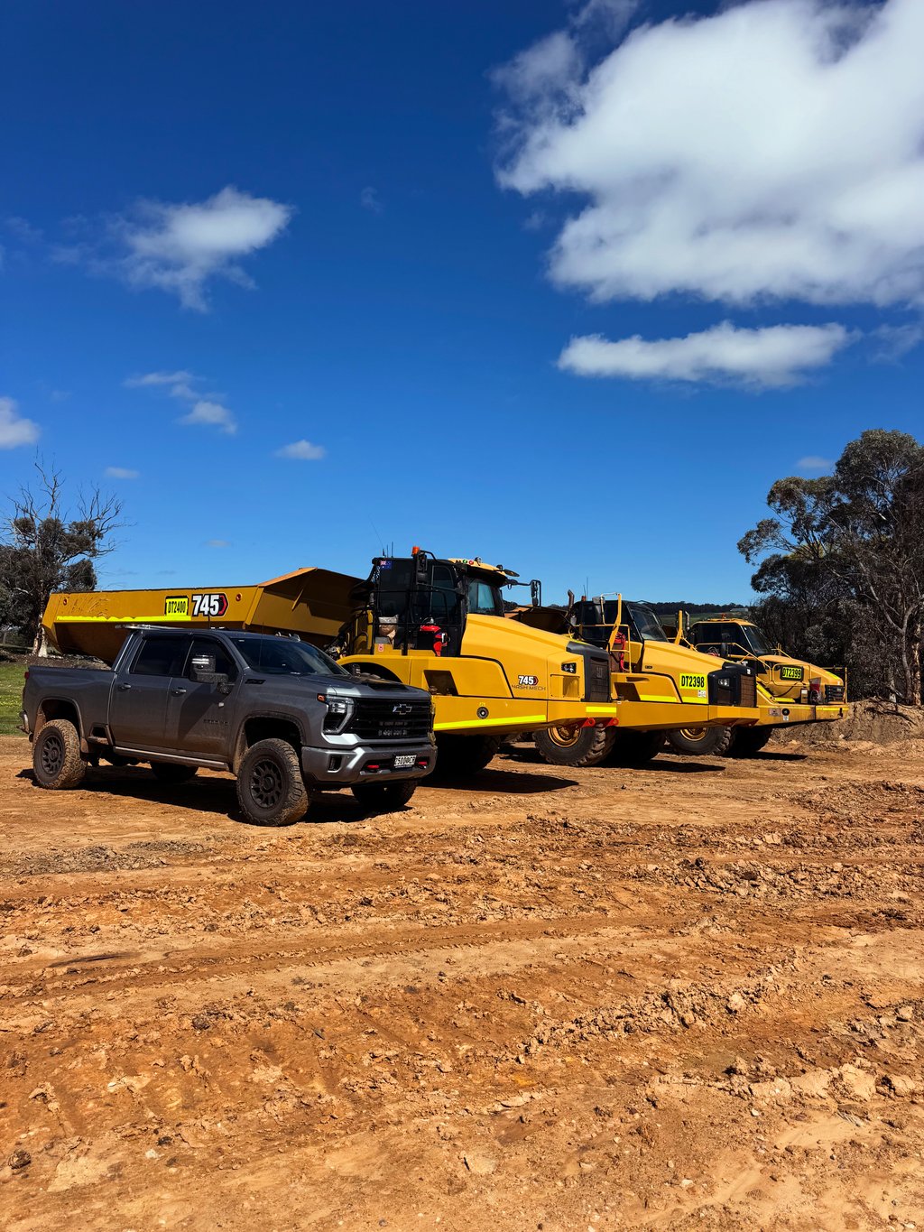 Three CM Haulage and Hire Cat dump trucks on dry hire to KGG Contracting on an NRW project